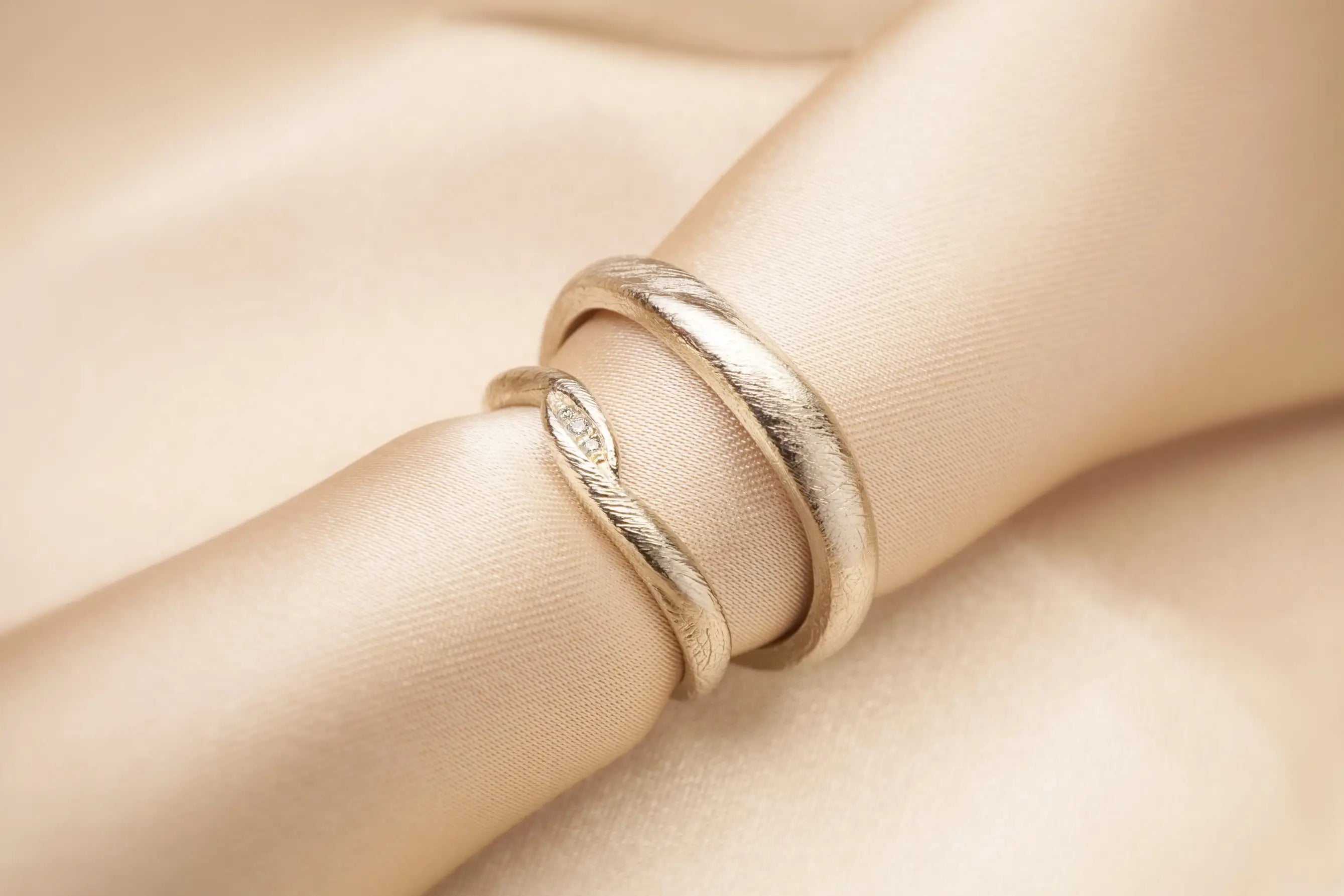 Chia Jewelry custom wedding rings unique design with 14kt gold and diamonds. Inspired by Harmonizing