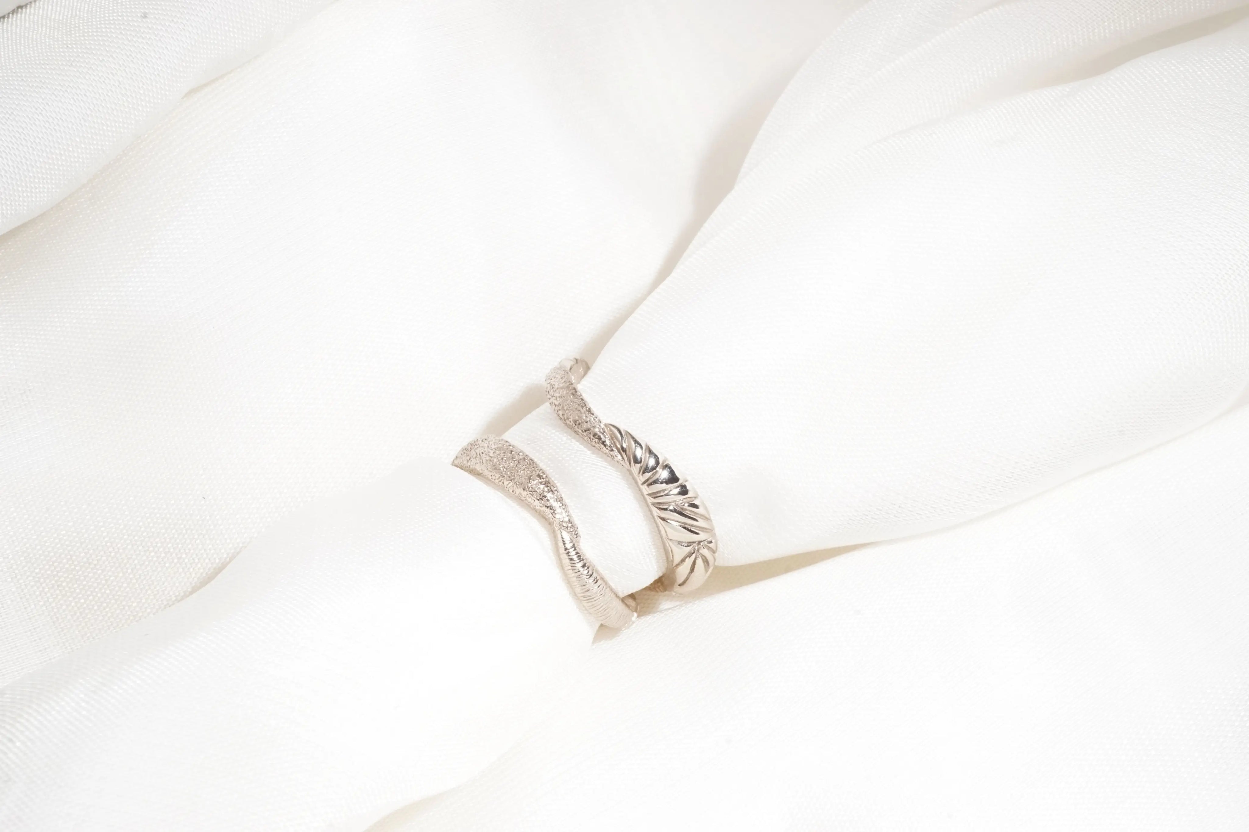 Chia Jewelry custom wedding rings unique design with 14kt gold. Inspired by Sun and Moon