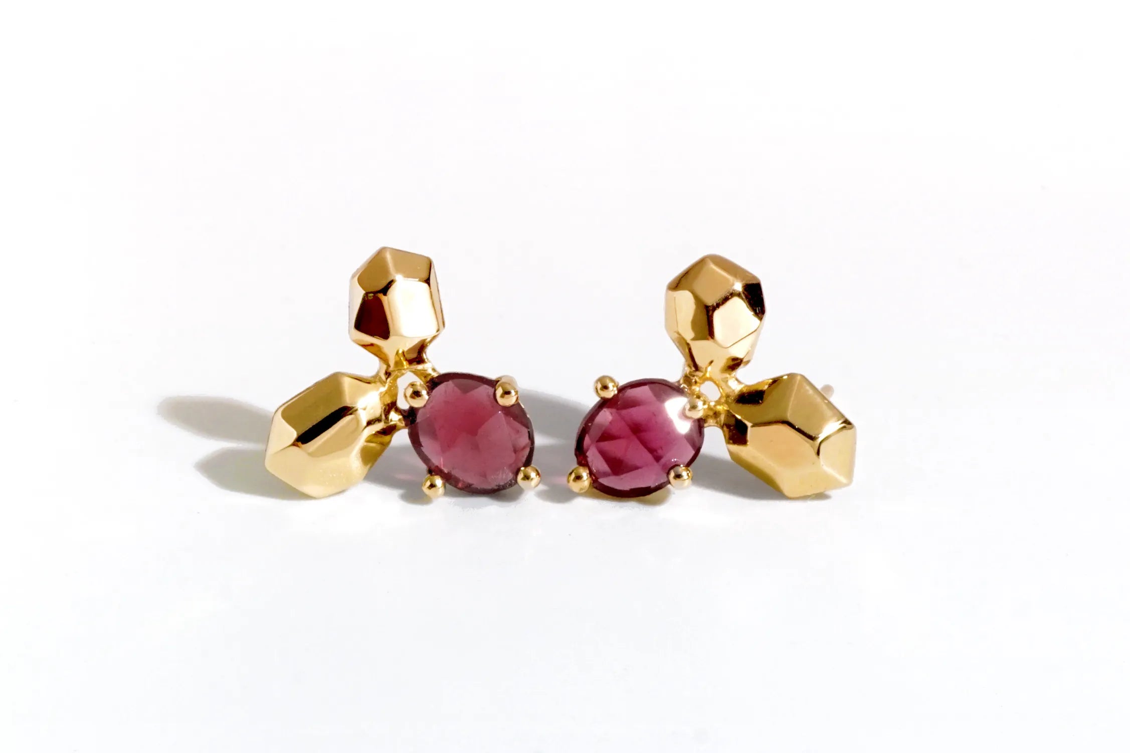 Chia Jewelry gem stones earrings design collection. 14kt gold garnet stud earrings for women