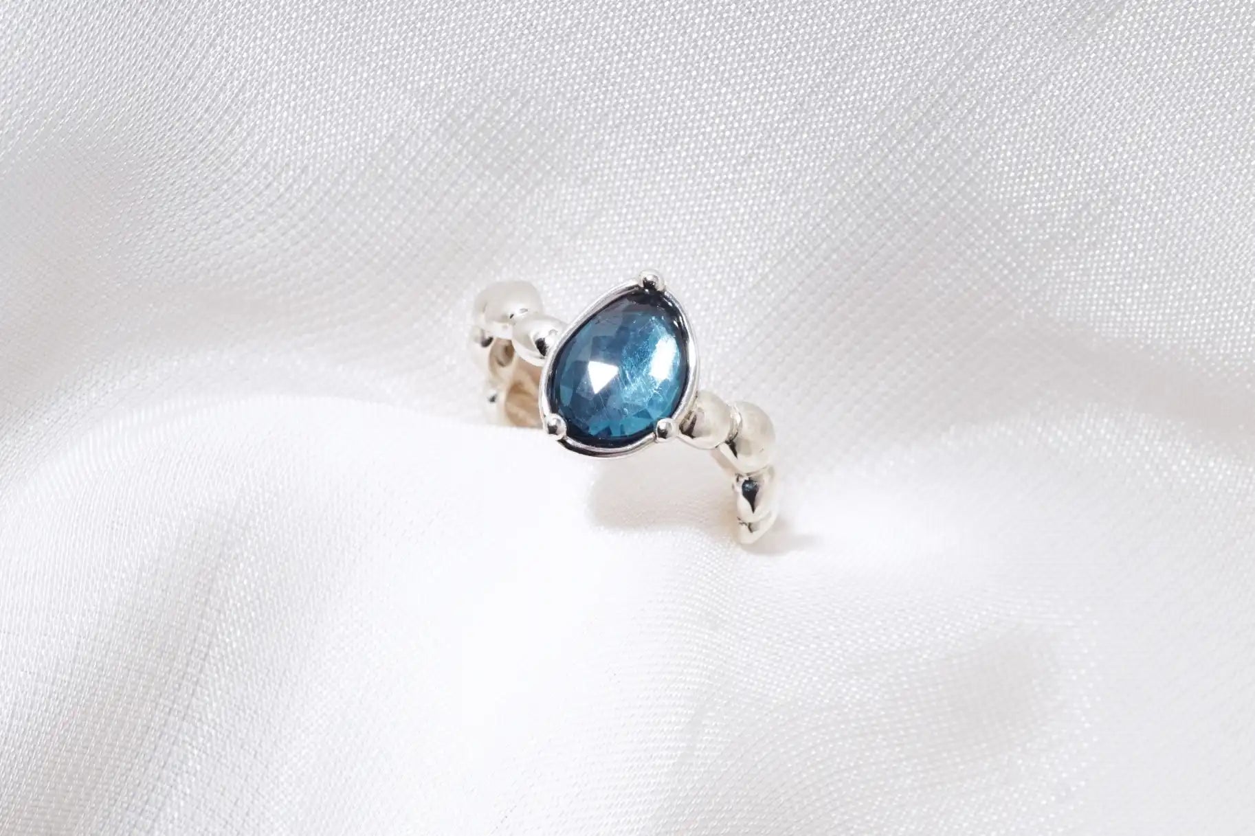 Chia Jewelry gem stones rings design collection.One of a kind silver topaz simple and artistic bean pebbles statement ring.