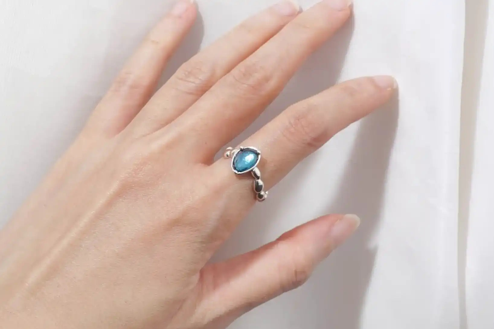 Chia Jewelry gem stones rings design collection.One of a kind silver topaz simple and artistic bean pebbles statement ring.