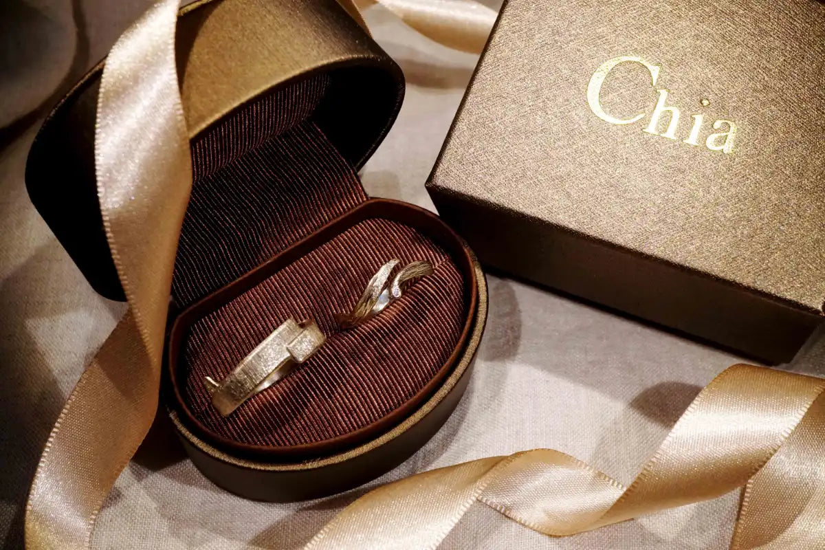 Testimonial and review of Chia Jewelry custom Wedding Rings: 14kt gold and diamond wedding bands inspired by wind and rain