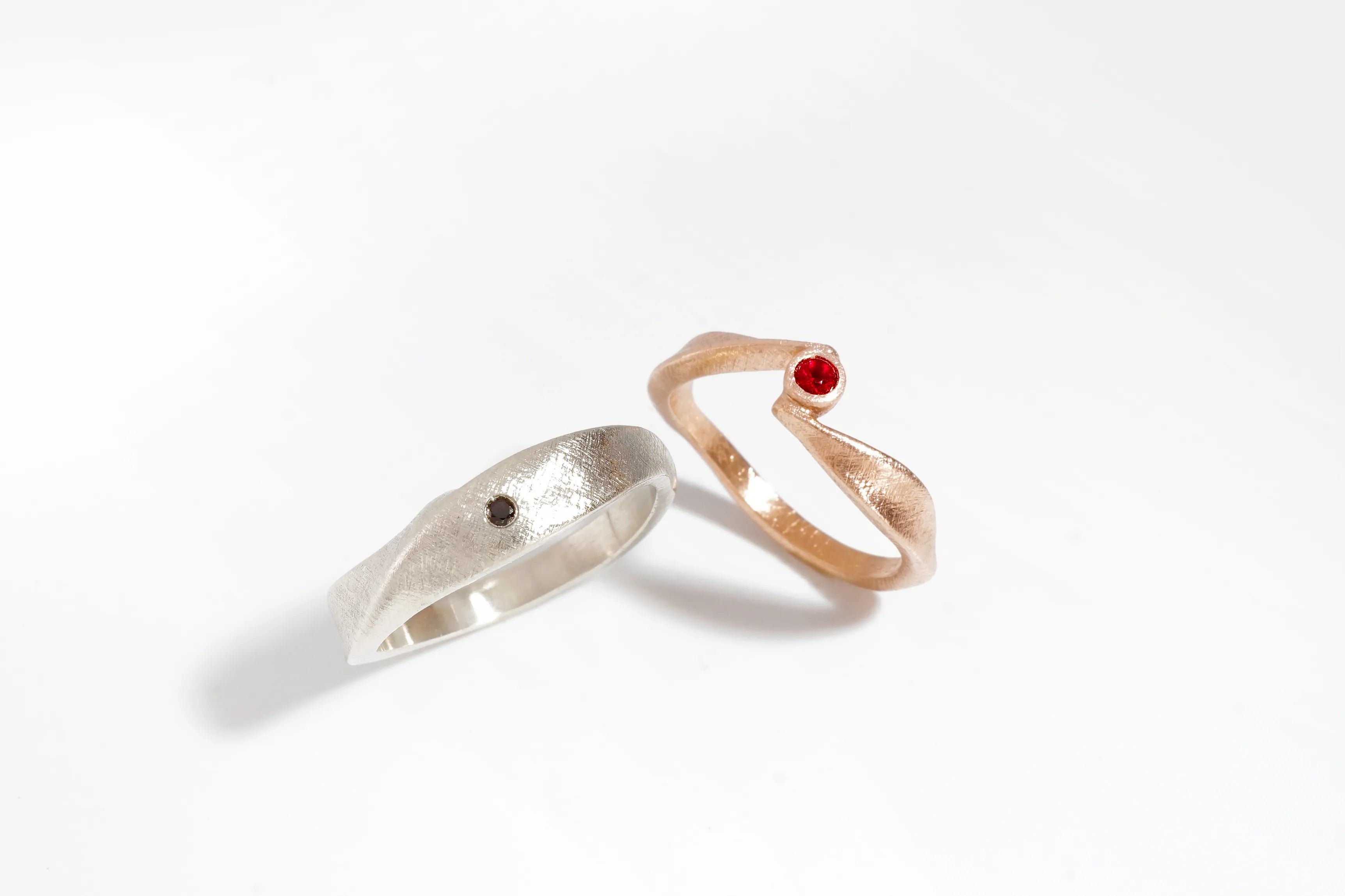 Chia Jewelry unique custom wedding rings. Spinel and ruby 14kt gold wedding rings with meaningful stories