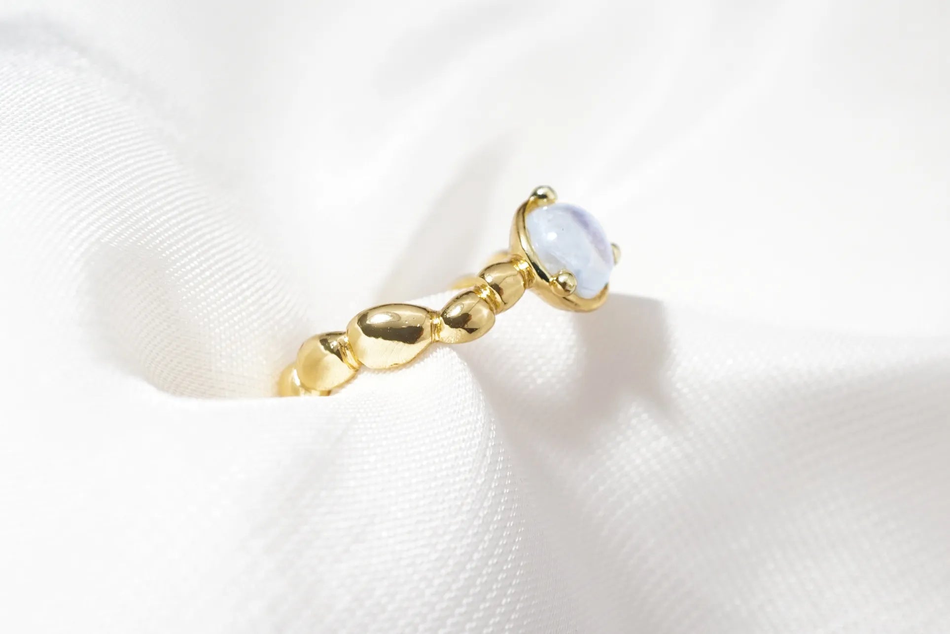 Chia Jewelry gem stones rings design collection.One of a kind gold moonstone simple and artistic bean pebbles statement ring.