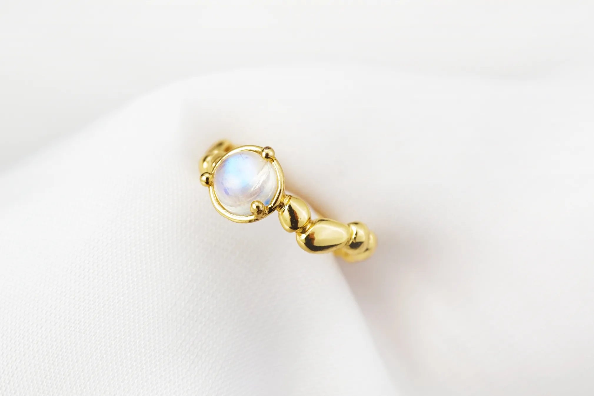Chia Jewelry gem stones rings design collection.One of a kind gold moonstone simple and artistic bean pebbles statement ring.